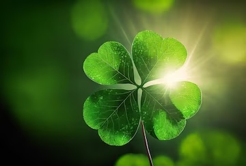 four-leaf-clover-luckyon-sunshine-background-st-patrick-s-day-backdrop-generative-ai_741672-1178